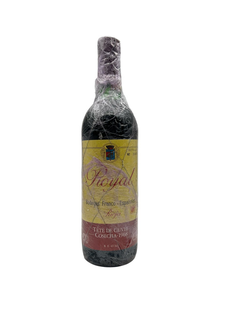 Bouteille de vin rouge Royal Bodegas Franco Españolas 1968 enveloppée dans du plastique