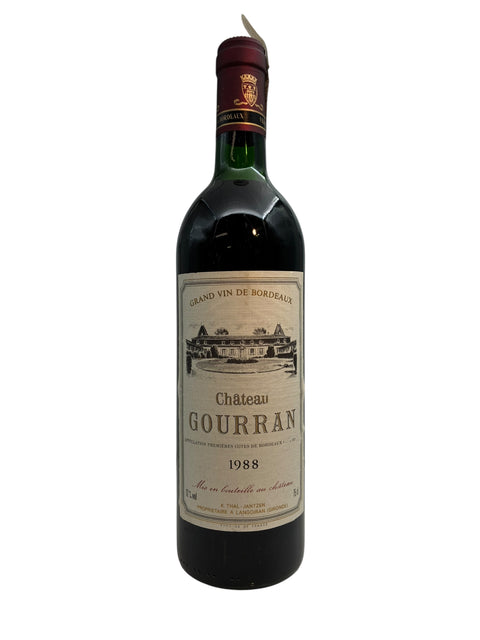 Bouteille de vin rouge Château Gourran 1988 avec étiquette