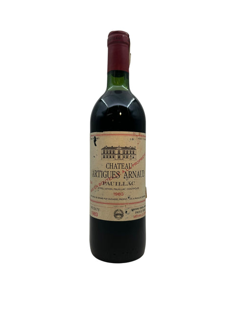 Bouteille de vin rouge Château Artigues Arnaud 1983 avec étiquette classique